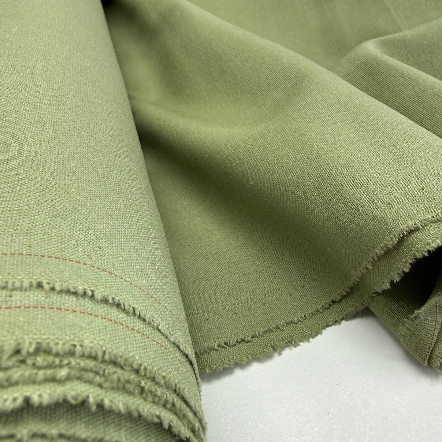 Linen + Viscose + Poly Mix - Dusty Sage fabric offering a soft and breathable blend, ideal for clothing and home decor projects