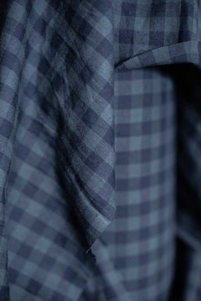 Close-up of Uniform Blues Organic Cotton Linen Gingham fabric by Merchant & Mills, showcasing the 1.2cm check size and soft texture ideal for various sewing projects.