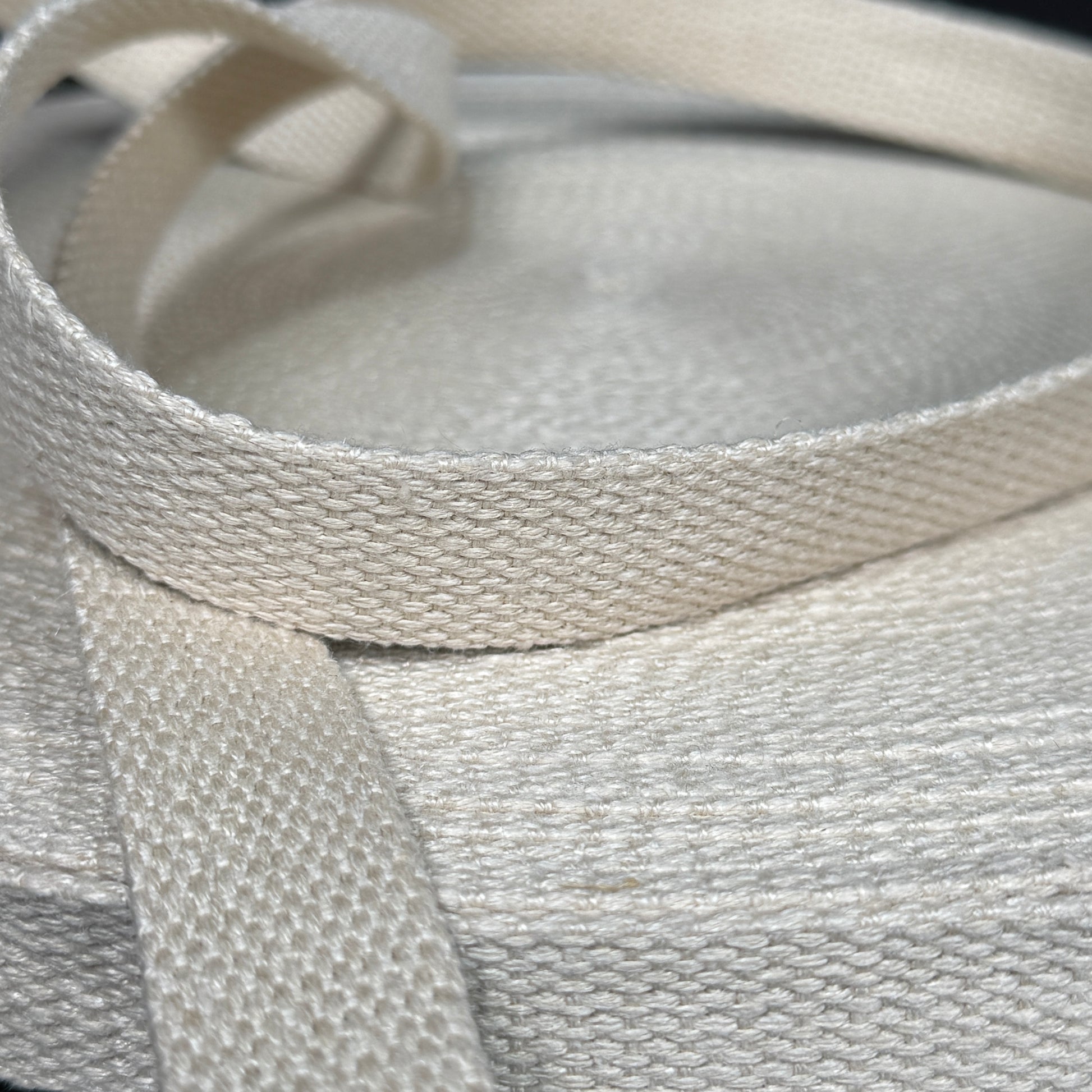 1" Hemp Webbing - Natural (undyed/unbleached) showcasing its eco-friendly and durable fabric, perfect for crafting bag straps, belts, and home decor.
