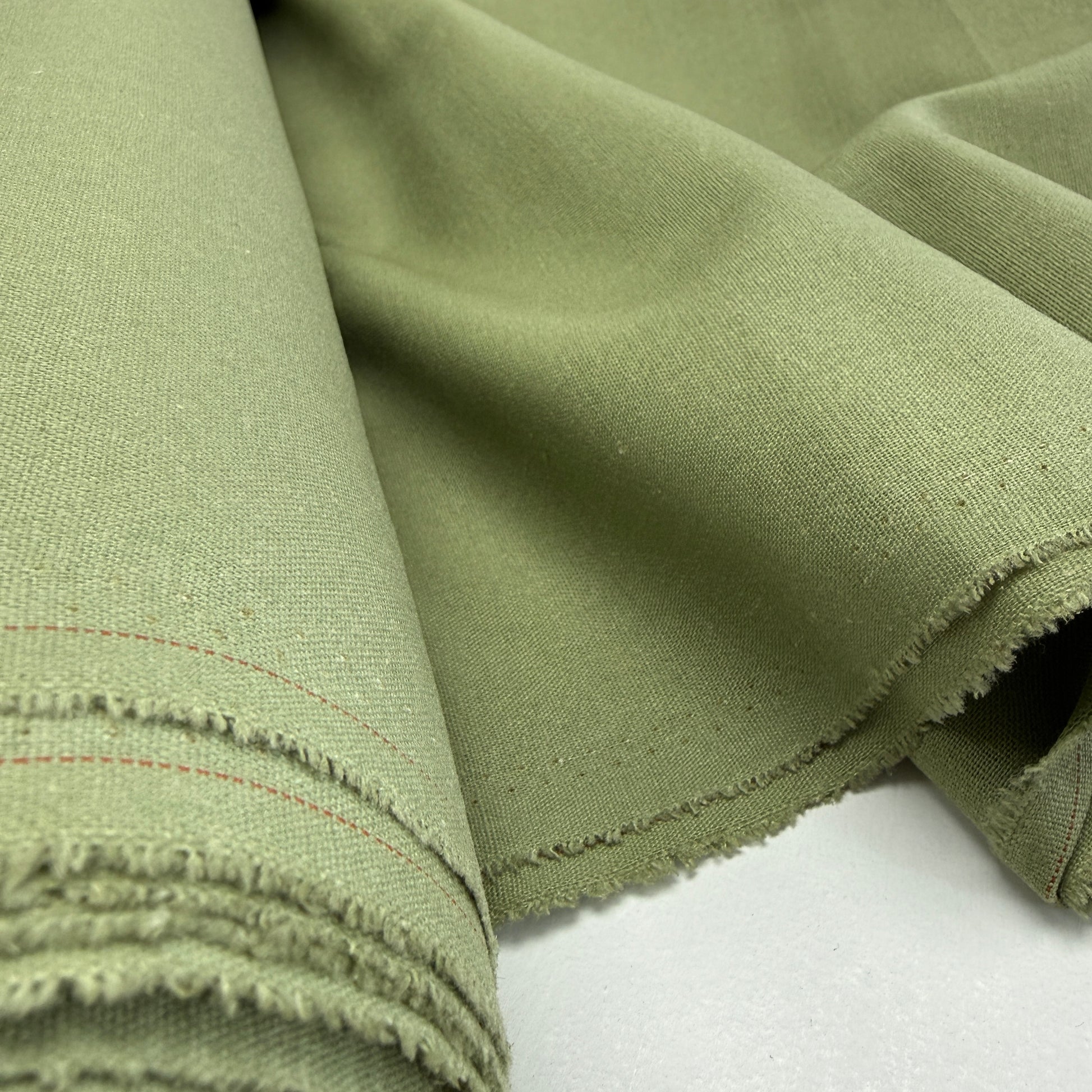 Linen + Viscose + Poly Mix - Dusty Sage fabric offering a soft and breathable blend, ideal for clothing and home decor projects