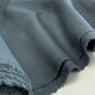 Dark Teal fabric made from a blend of Linen, Viscose, and Poly, showcasing its soft texture and versatility for apparel and home decor.